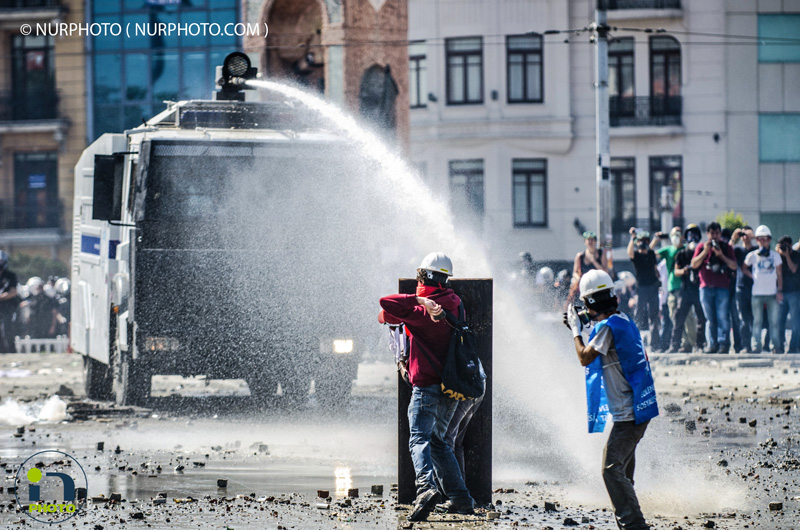 Clashes between police and protesters in Taksim Square. Police fired tear gas and water cannons in Taksim Square on June 11, 2013, the 11th day of anti-government protests in Turkey.  Photo: Kaan Saganak/NurPhoto